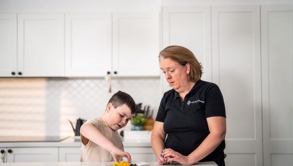 Healthproof new graduate clinician building clinical confidence while assessing a client at home