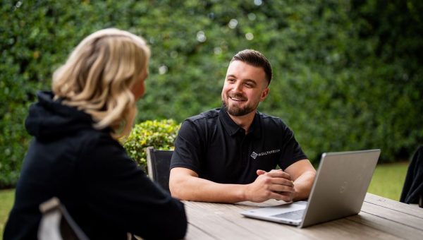 New graduate allied health clinician managing a supported caseload with a mentor during month two of the Healthproof program