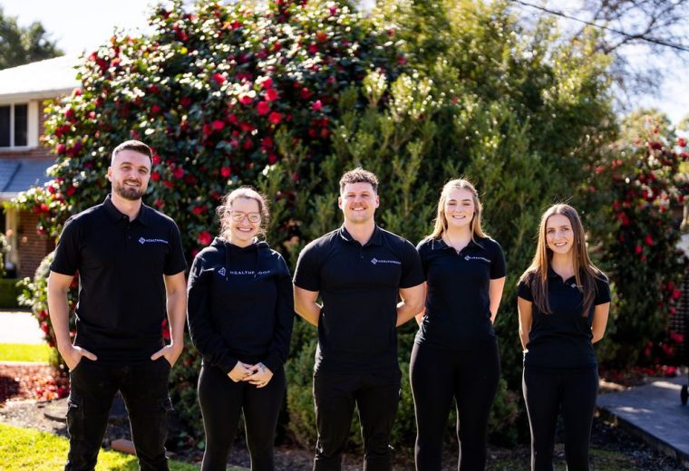 The Healthproof clinical team standing together outside
