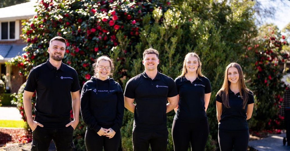 The Healthproof clinical team standing together outside
